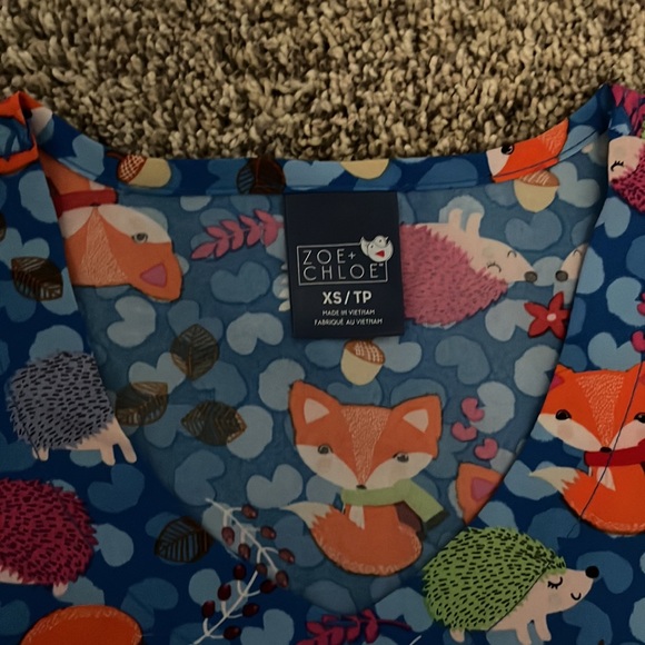 New scrub top. Never worn. - Picture 2 of 2